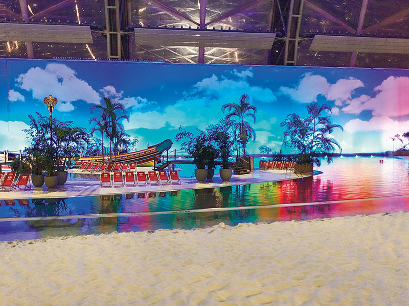 The South Seas at Tropical Islands festively illuminated in bright colours.