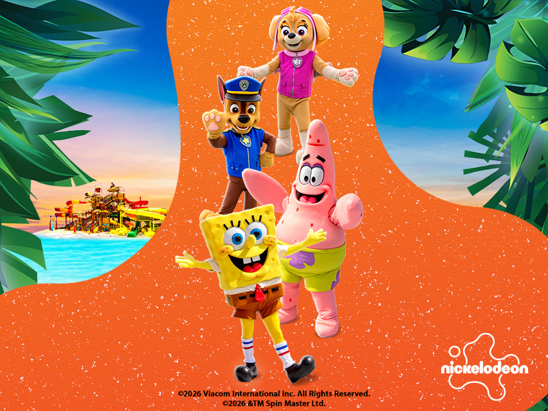 SpongeBob, Patrick, Chase, and Skye are in the foreground, with the slides of the Jungle Splash at Tropical Islands in the background.