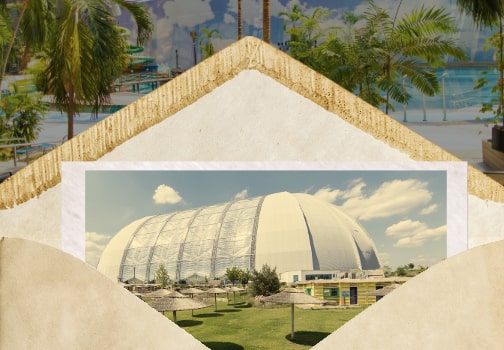  Photo of Tropical Islands dome in greenery, partially inside an open envelope.